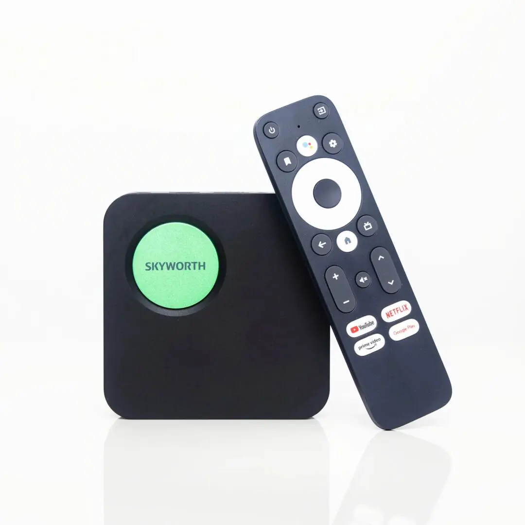 A remote control and a black box on a white background