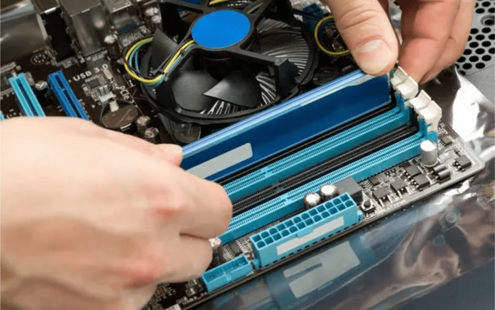 A person working on an electronic device.